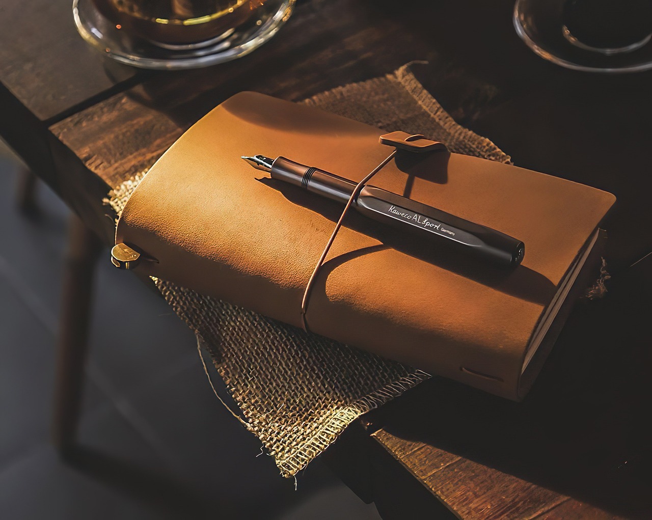 book, pen, notebook